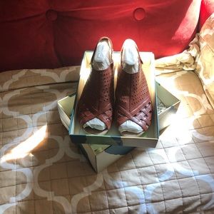 Chestnut colored size 11 W sandal. Wore twice. very comfortable. 1/2 wedge heel.
